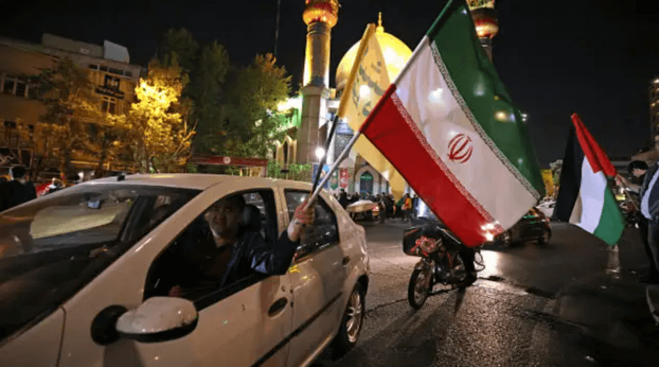 Iranians celebrate the counterattack against Israel